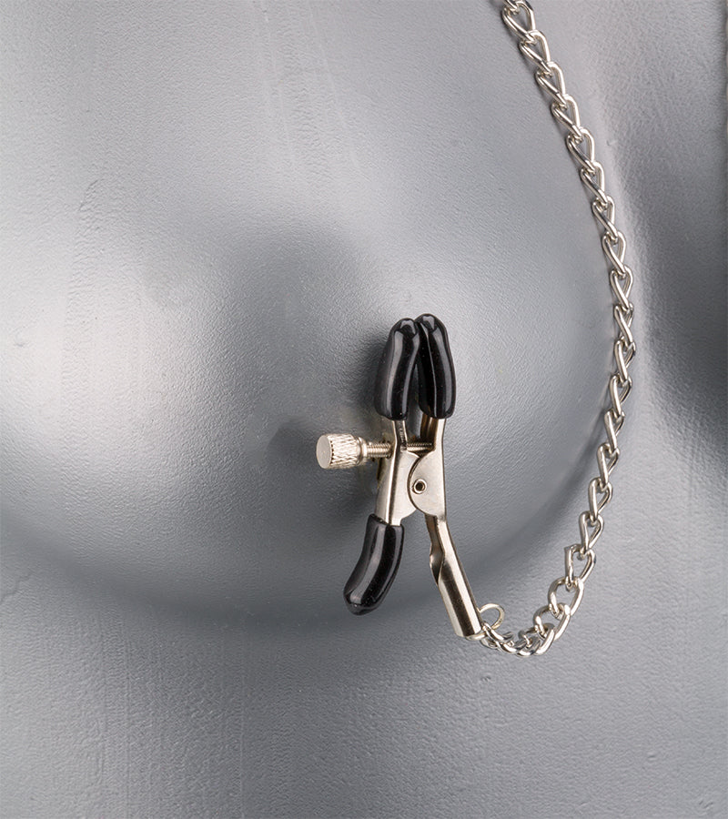 BDSM ball gag with nipple clamps