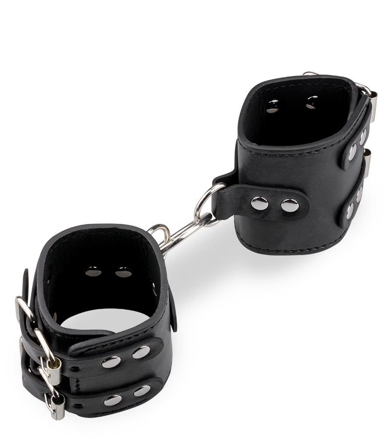 Black leather BDSM handcuffs with straps