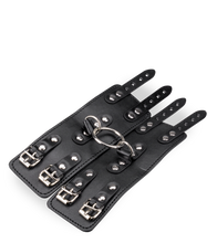 Load image into Gallery viewer, Black leather BDSM handcuffs with straps