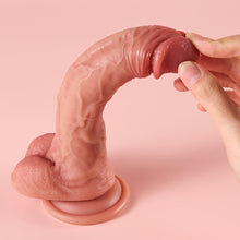 Load image into Gallery viewer, Joylume Constant Touch strap on compatible silicone dildo shown in lifestyle setting