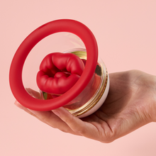 Load image into Gallery viewer, Joylume Hungry Rose handheld rose suction vibrator shown in lifestyle setting