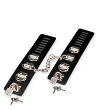 Load image into Gallery viewer, Leather and metal wrist cuffs