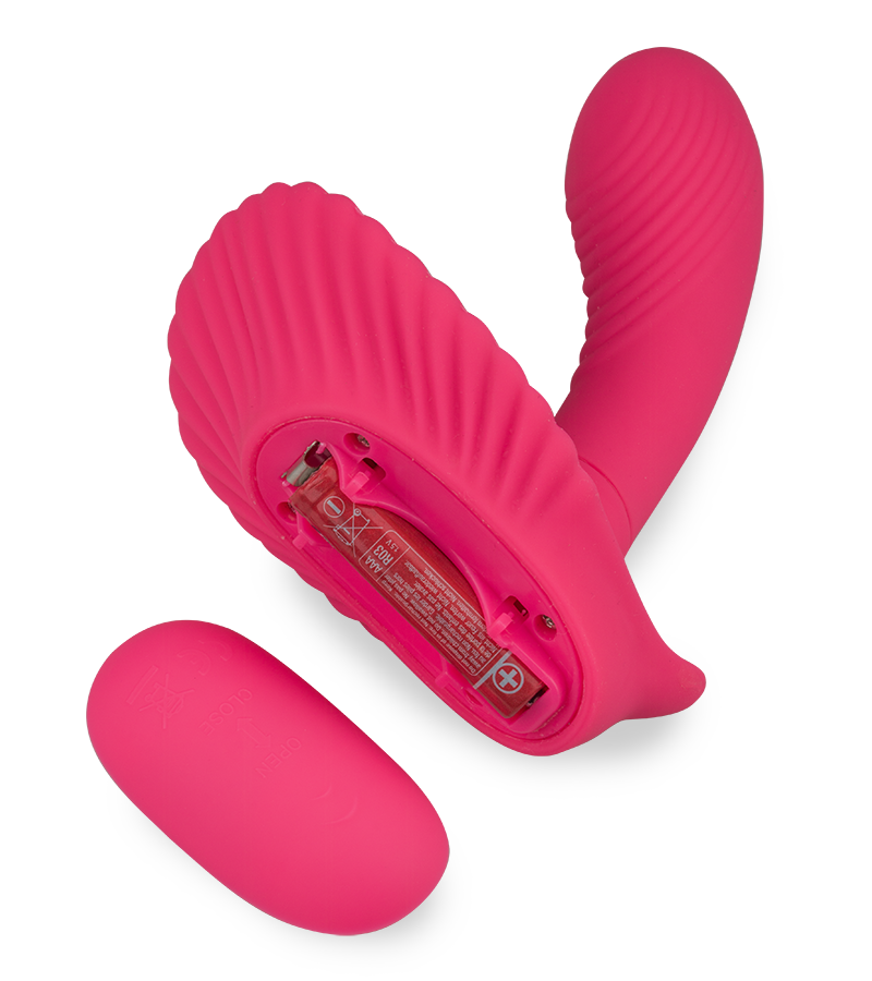 Remote control vibrating shell wearable dildo