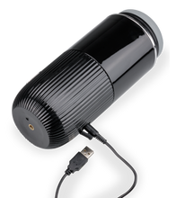 Load image into Gallery viewer, Spinny masturbator with rotating sleeve and suction-cup base